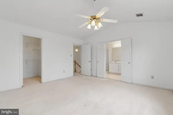 an empty room with a bathroom