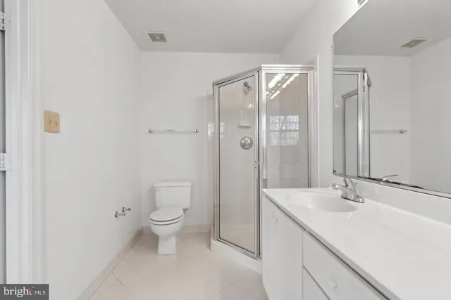 a house view with a swimming pool and outdoor seating