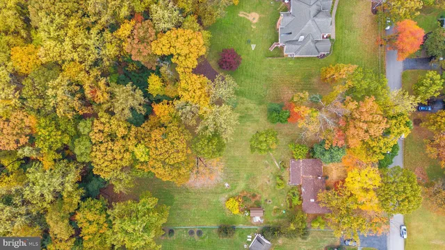 a bathroom with a yard and lake view