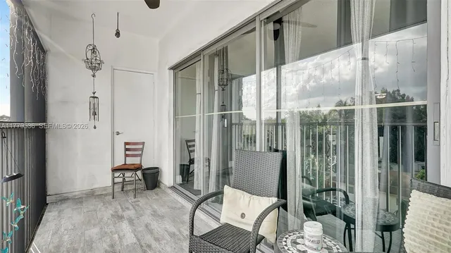 a view of a balcony with chair