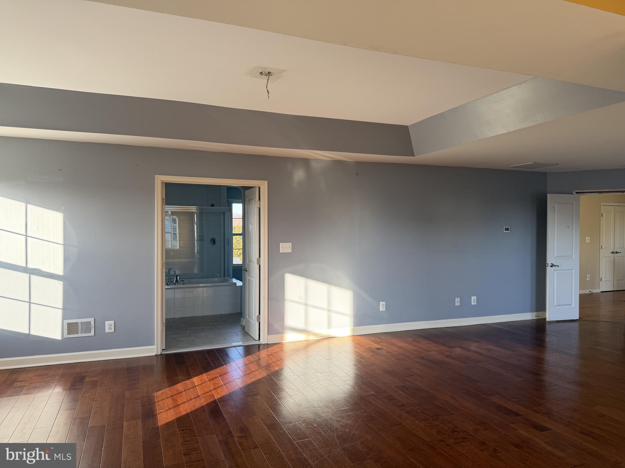 40 Loder Drive Smyrna, DE 19977 - Photo 11 of 29 a view of an empty room with wooden floor and a window