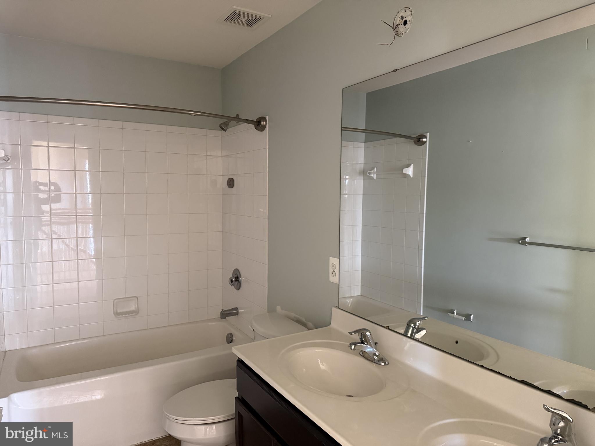 40 Loder Drive Smyrna, DE 19977 - Photo 15 of 29 a bathroom with a sink toilet tub and shower