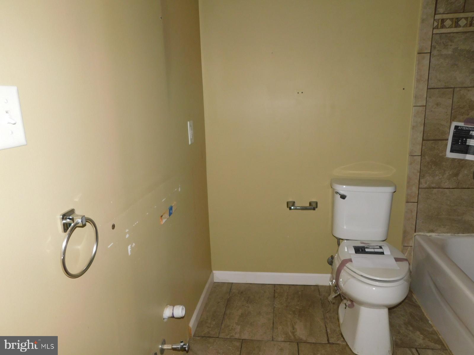 40 Loder Drive Smyrna, DE 19977 - Photo 23 of 29 a bathroom with a toilet and a shower