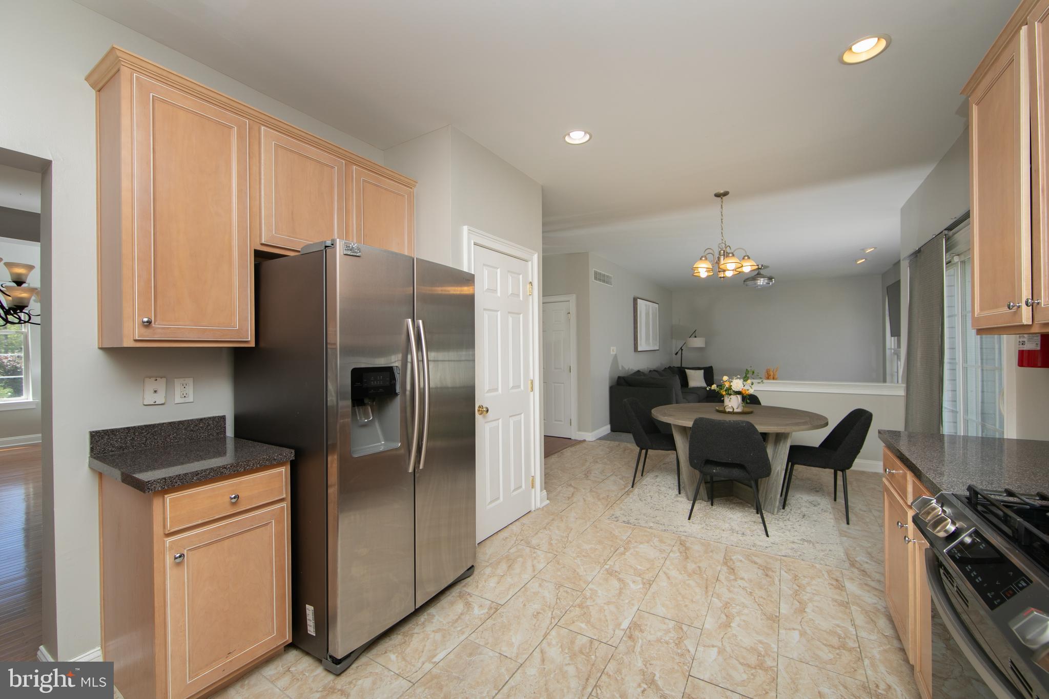 4 Conifer Way Sicklerville, NJ 08081 - Photo 14 of 39 a kitchen with stainless steel appliances granite countertop a refrigerator and a stove top oven