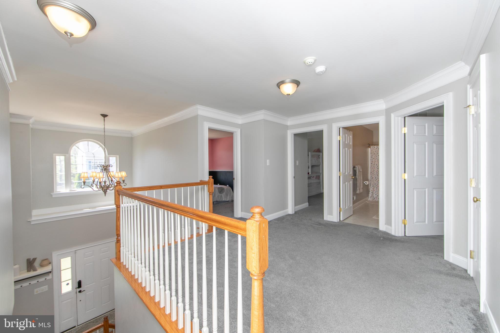 4 Conifer Way Sicklerville, NJ 08081 - Photo 18 of 39 a view of a hallway with closet and a livingroom