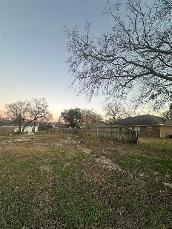 606 Mill Street Gainesville, TX 76240 - Photo 2 of 3 a view of a yard