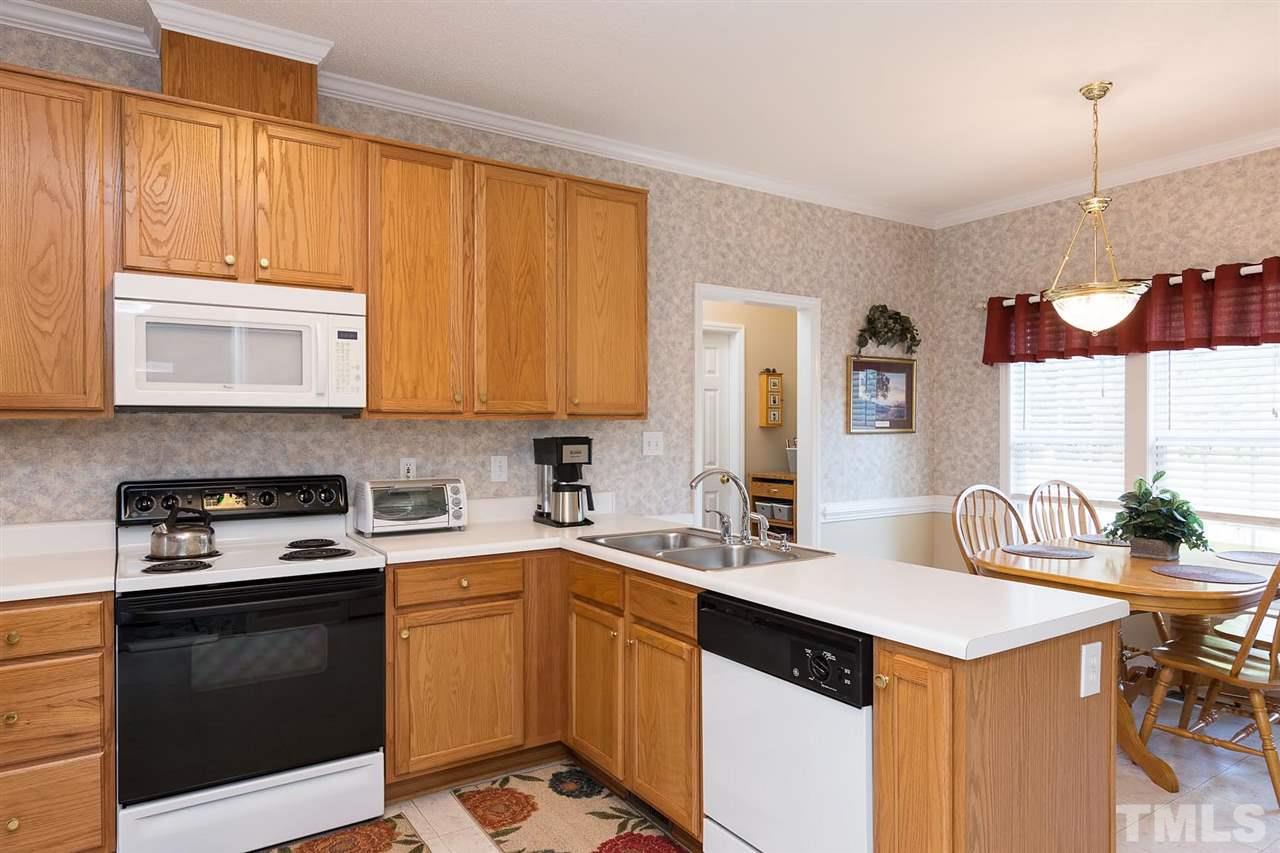 Space enough for more then one cook in this kitchen. Lots of storage and counter space. Large shelved walk in pantry.