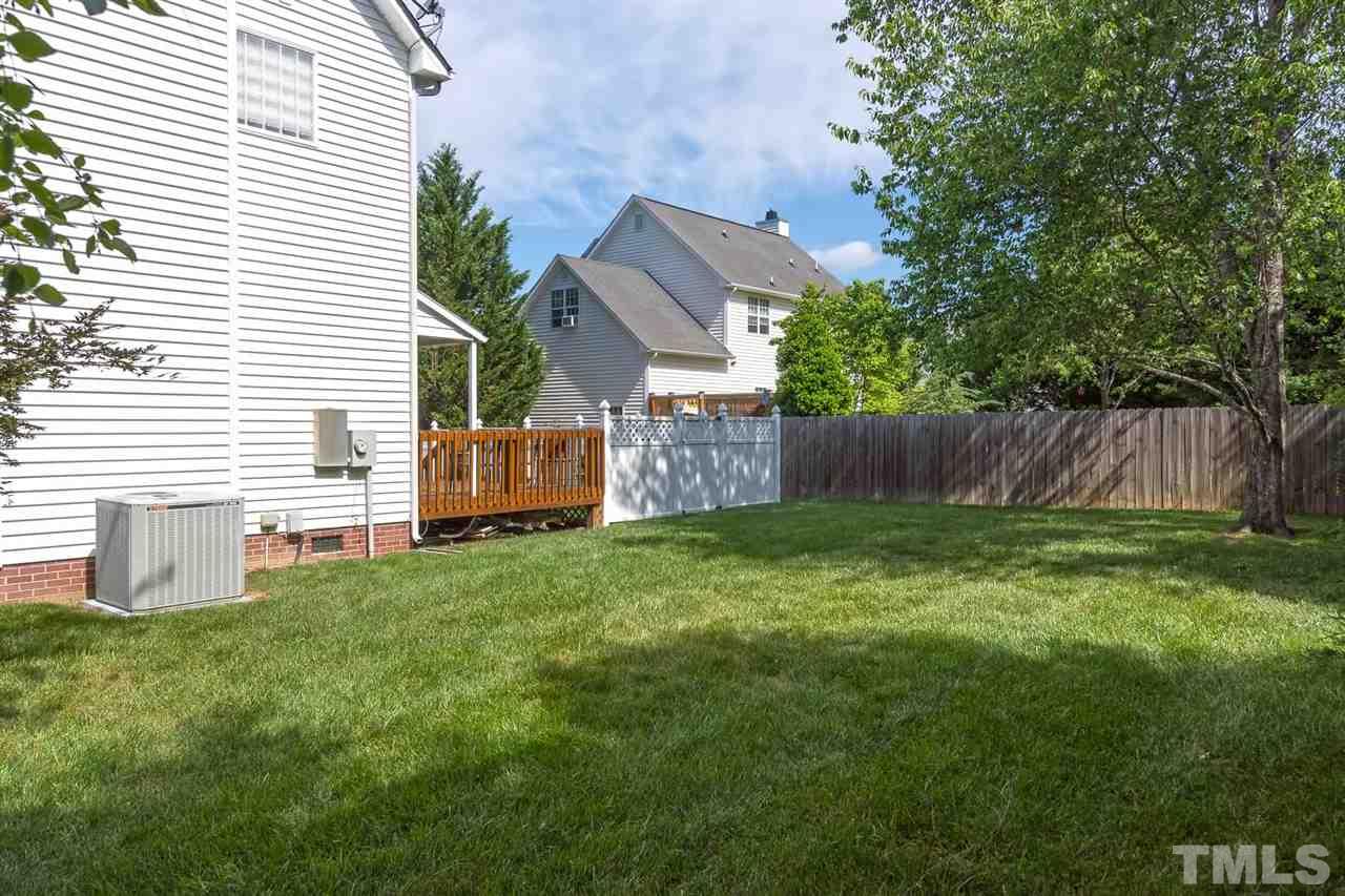4401 Riverport Road Raleigh, NC 27616 - Photo 20 of 22 Lots of space to play games with your family and friends. Envision many hours of fun in this part of the yard.