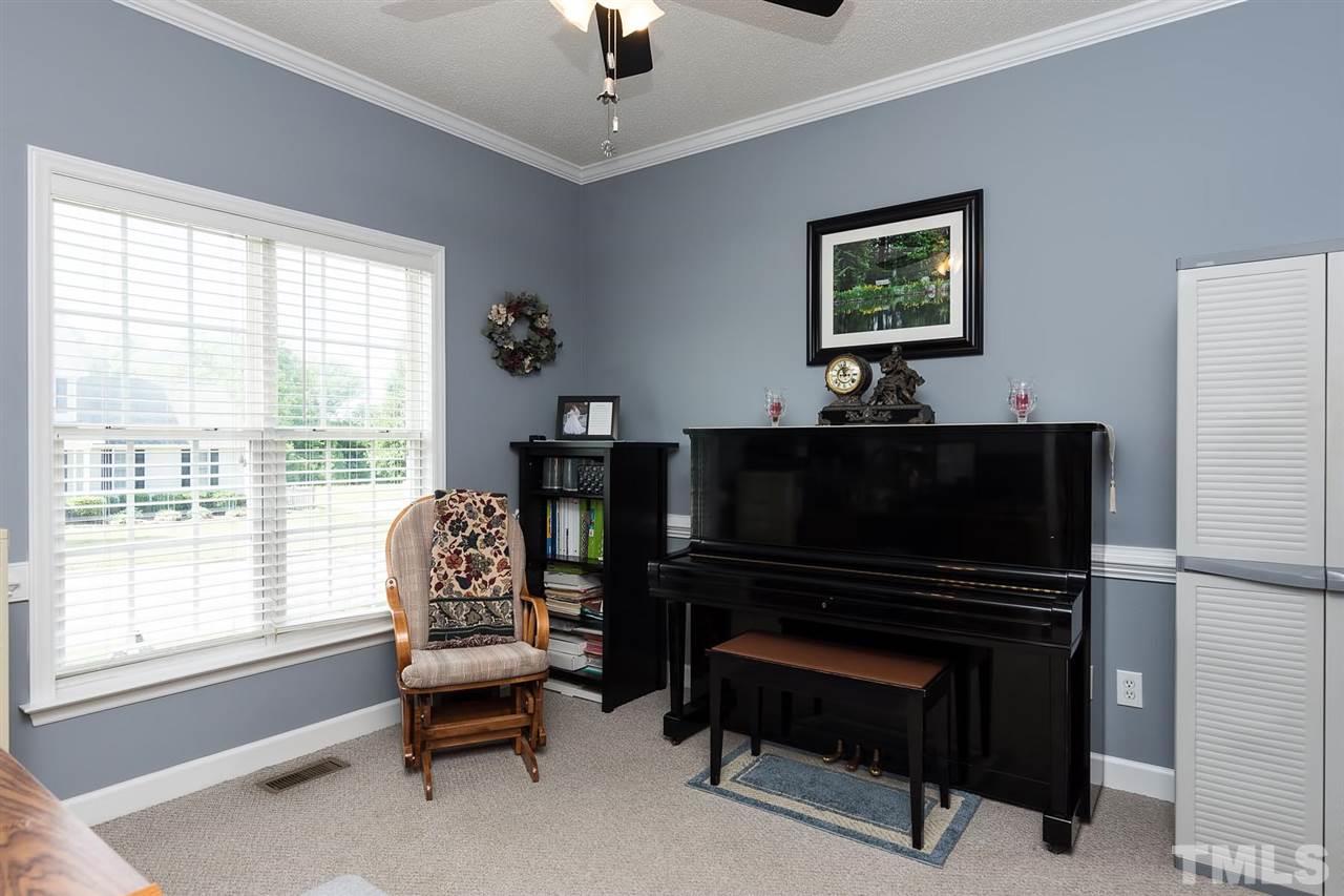 Formal dining room is large enough to fit the whole family during special occasions.
