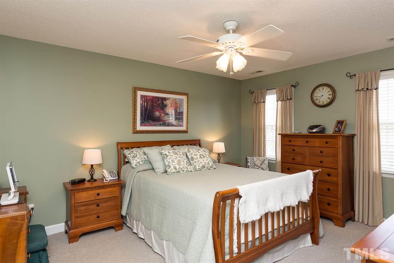 4401 Riverport Road Raleigh, NC 27616 - Photo 9 of 22 Master has ample room for a king size bed and all the furniture that goes with it. Pretty soft green color is very soothing.