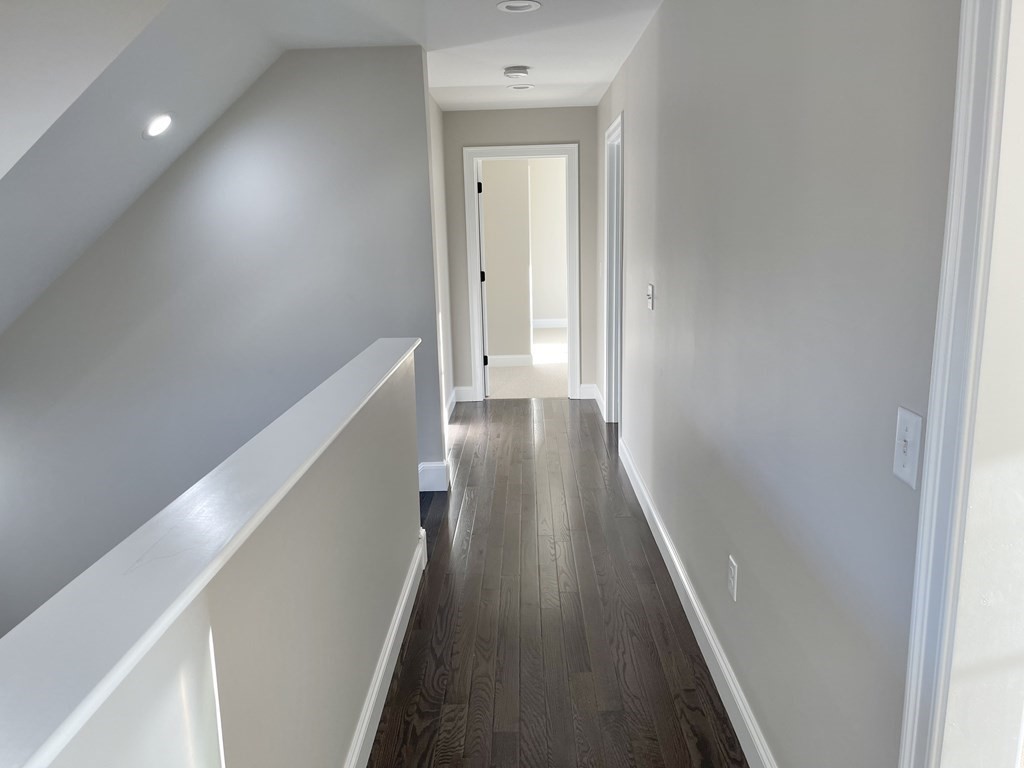 158 Snipatuit Road Rochester, MA 02770 - Photo 27 of 39 a view of a hallway with wooden floor