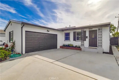 a front view of house with garage