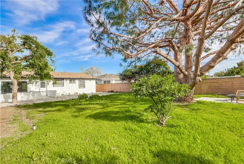 a view of a house with a big yard