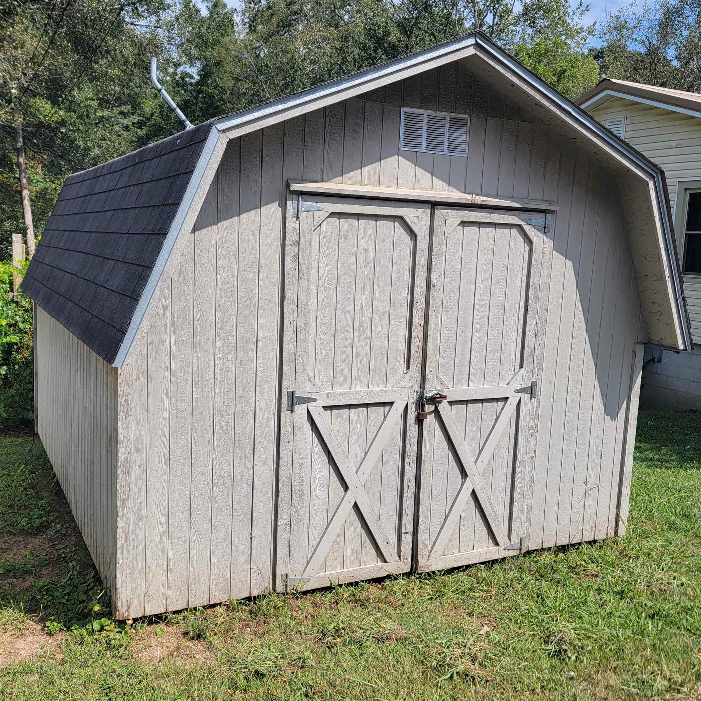 2012 Finger Leapwood Road Finger, TN 38334 - Photo 12 of 12 a blue house with a yard and wooden fence
