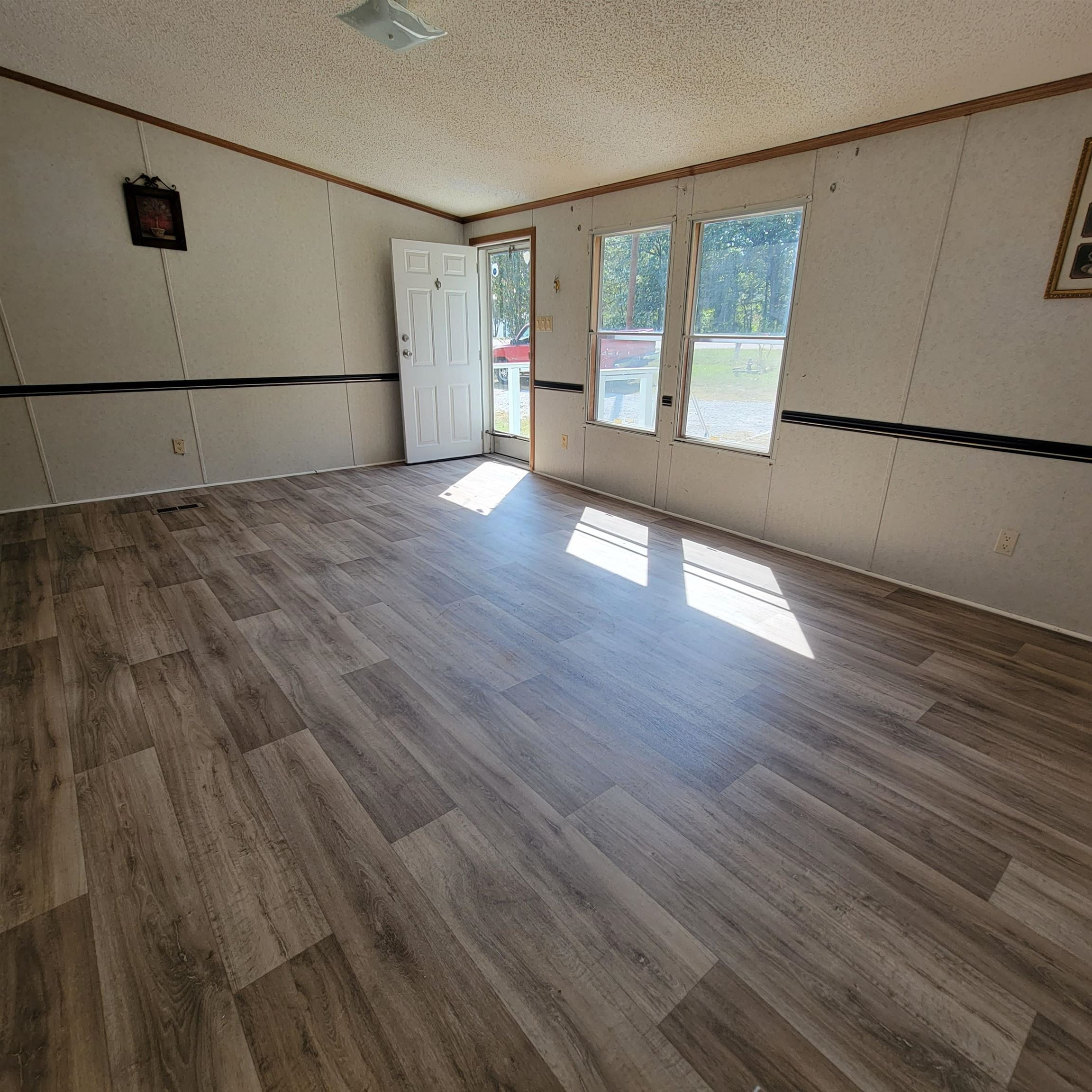 2012 Finger Leapwood Road Finger, TN 38334 - Photo 4 of 12 a view of empty room with wooden floor