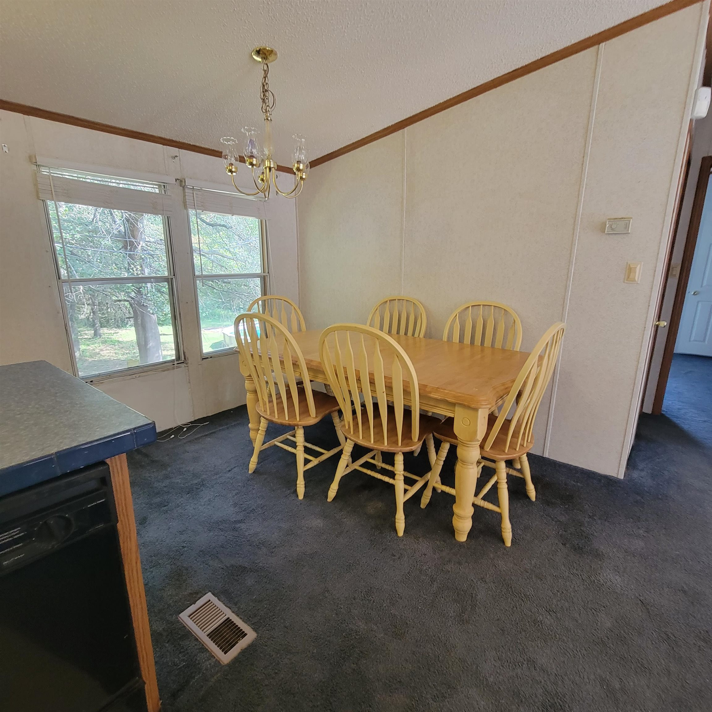 2012 Finger Leapwood Road Finger, TN 38334 - Photo 6 of 12 a view of a dining room with furniture window and outside view