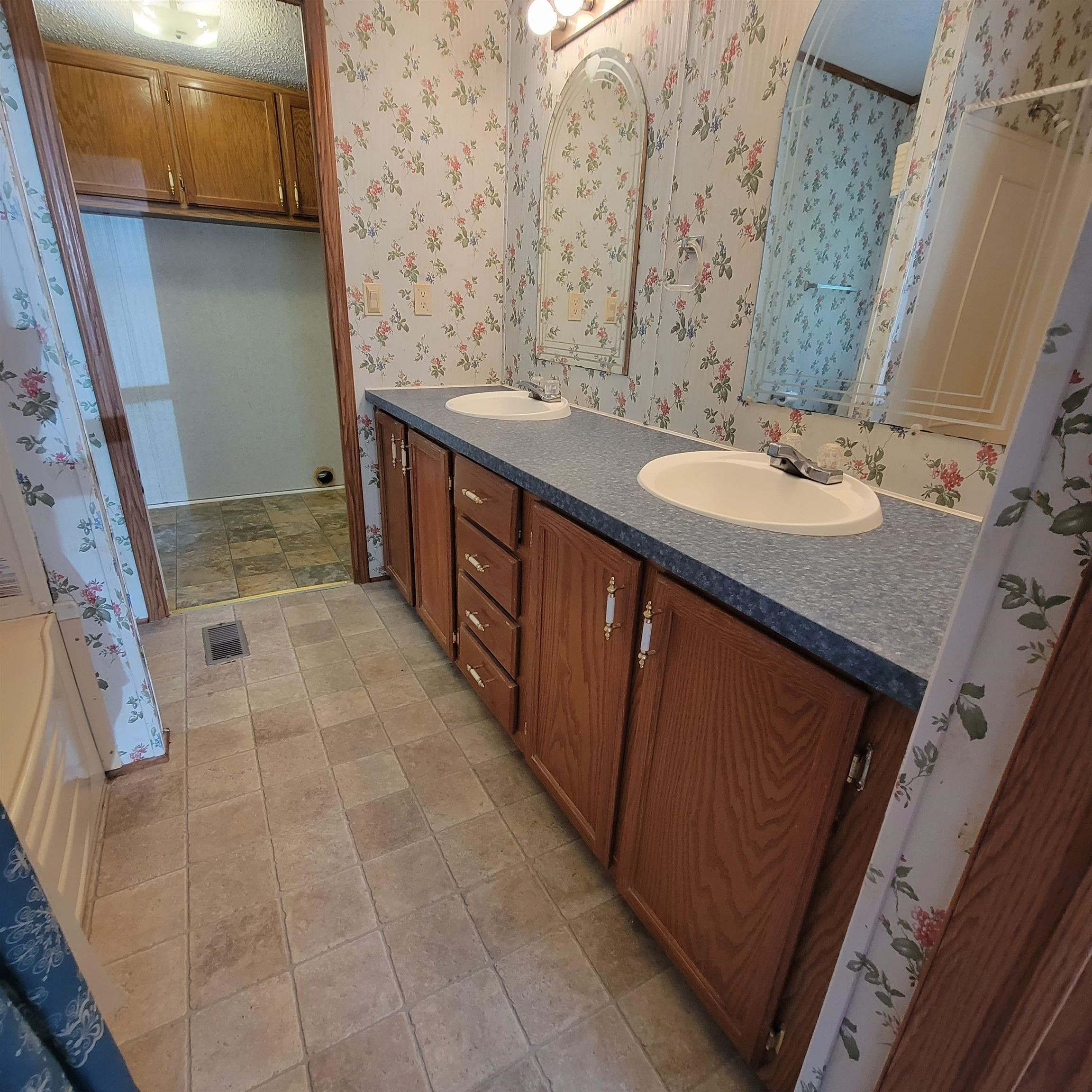 2012 Finger Leapwood Road Finger, TN 38334 - Photo 9 of 12 a bathroom with a sink a toilet and mirror