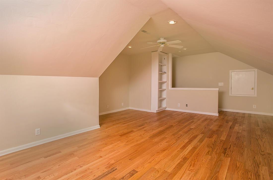 1228 Hunters Point Lane Spring Hill, TN 37174 - Photo 14 of 23 a view of empty room with wooden floor and fan