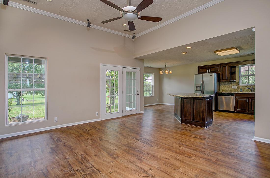 1228 Hunters Point Lane Spring Hill, TN 37174 - Photo 4 of 23 a view of kitchen with cabinets and wooden floor
