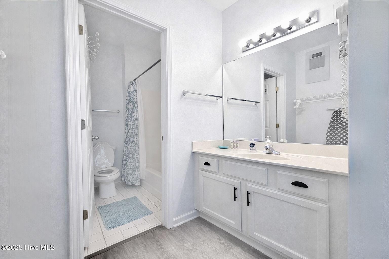165 Royal Poste Road, Unit 2911 Sunset Beach, NC 28468 - Photo 13 of 24 Clean, well-maintained bathroom with full tub/shower combo, vanity storage, and bright lighting
