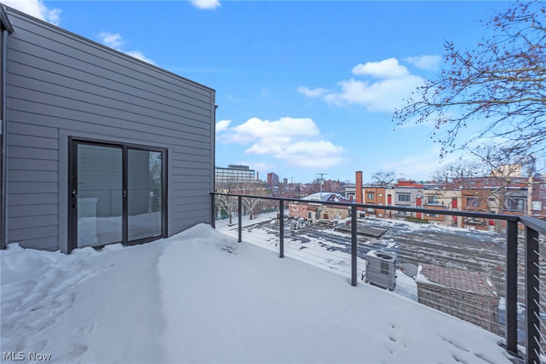 2149 Columbus Road Cleveland, OH 44113 - Photo 25 of 38 Snowy yard featuring a city view