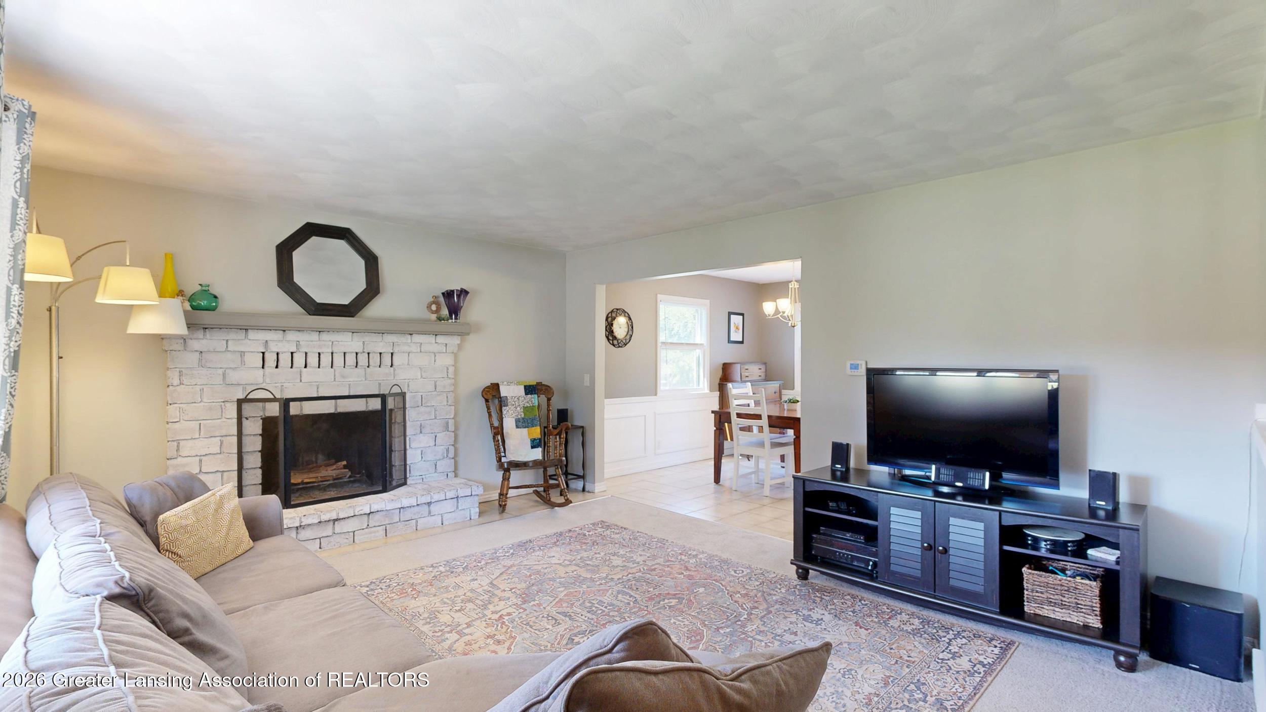 916 South Canal Road Lansing, MI 48917 - Photo 6 of 62 Living Room with Fireplace