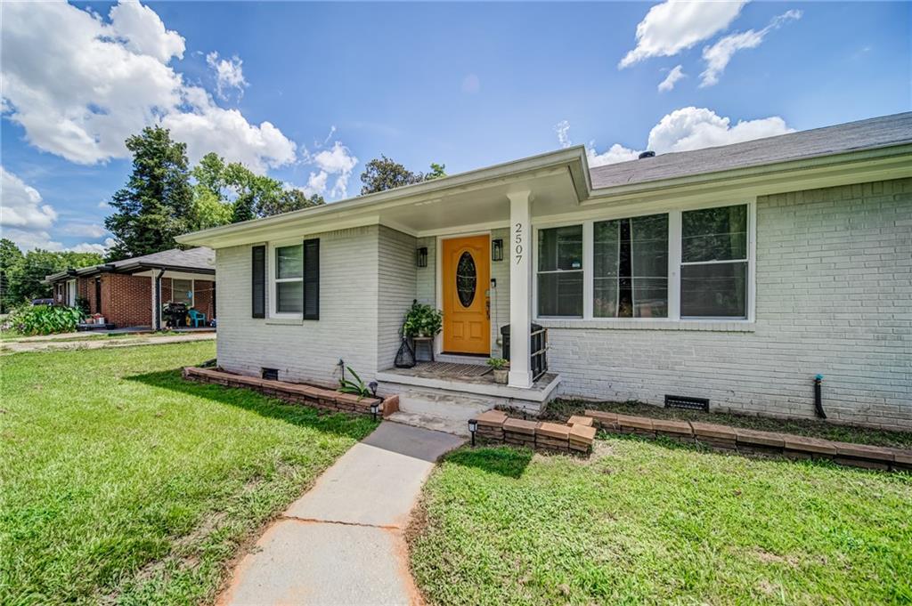 2507 Tilson Road Decatur, GA 30032 - Photo 1 of 1 a front view of a house with garden