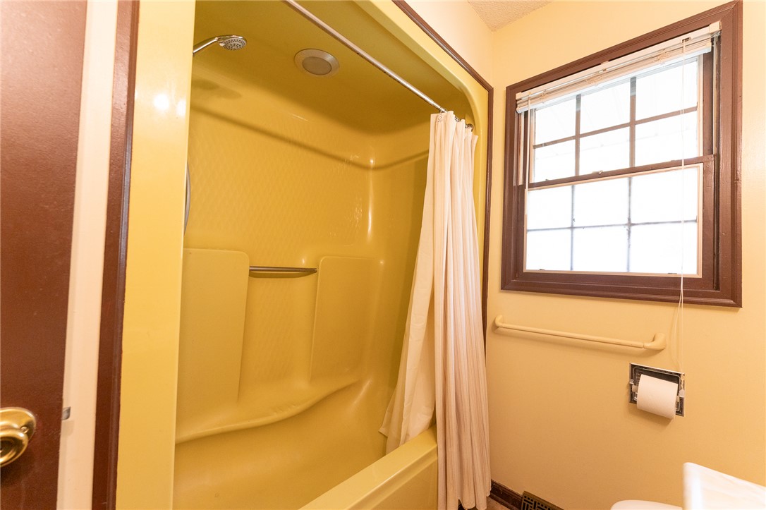 139 Todds Creek Road Central, SC 29630 - Photo 45 of 45 This bathroom features a functional shower and a window, offering a bright and practical space.
