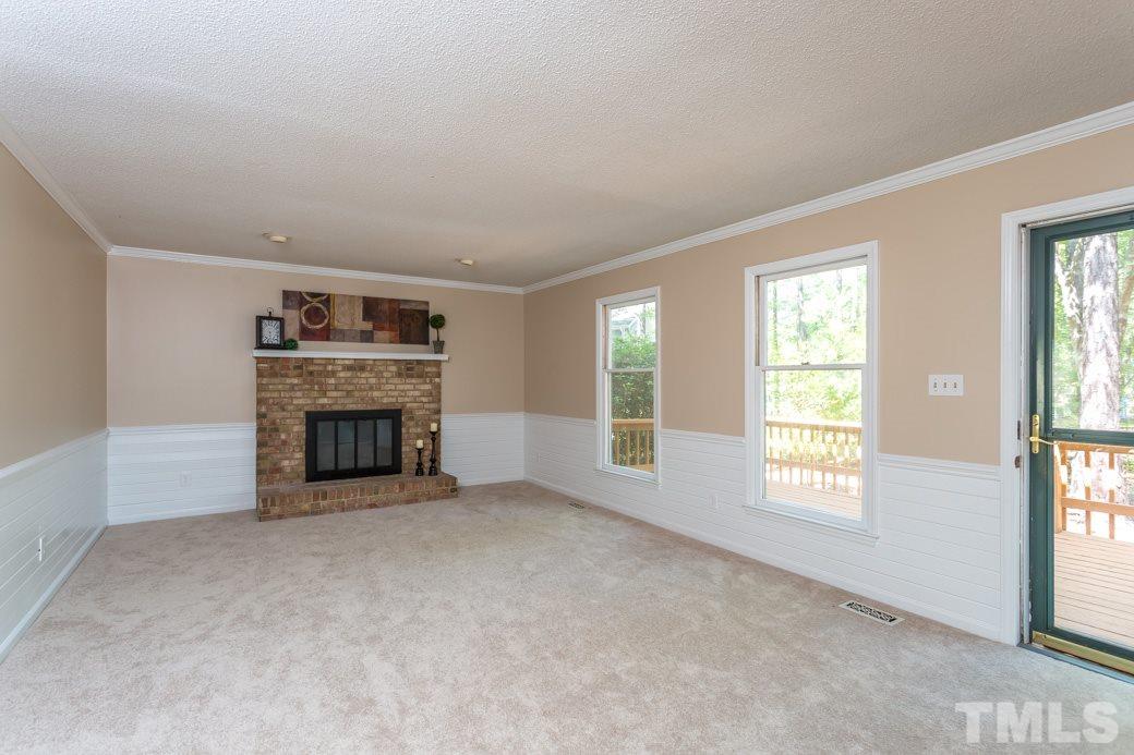 1117 Sedwick Road Durham, NC 27713 - Photo 3 of 13 a view of an empty room with a window
