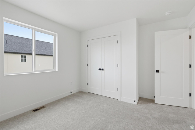 844 North 400 West Logan, UT 84321 - Photo 29 of 43 Neutral-toned carpet flooring complementing bright white walls
