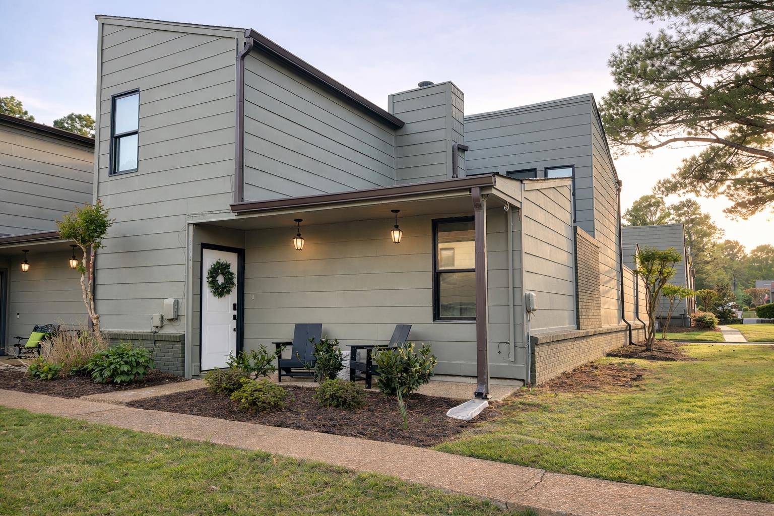 8461 Rothchild Road, Unit 37 Germantown, TN 38139 - Photo 1 of 28 View of front of home with a front lawn and a chimney