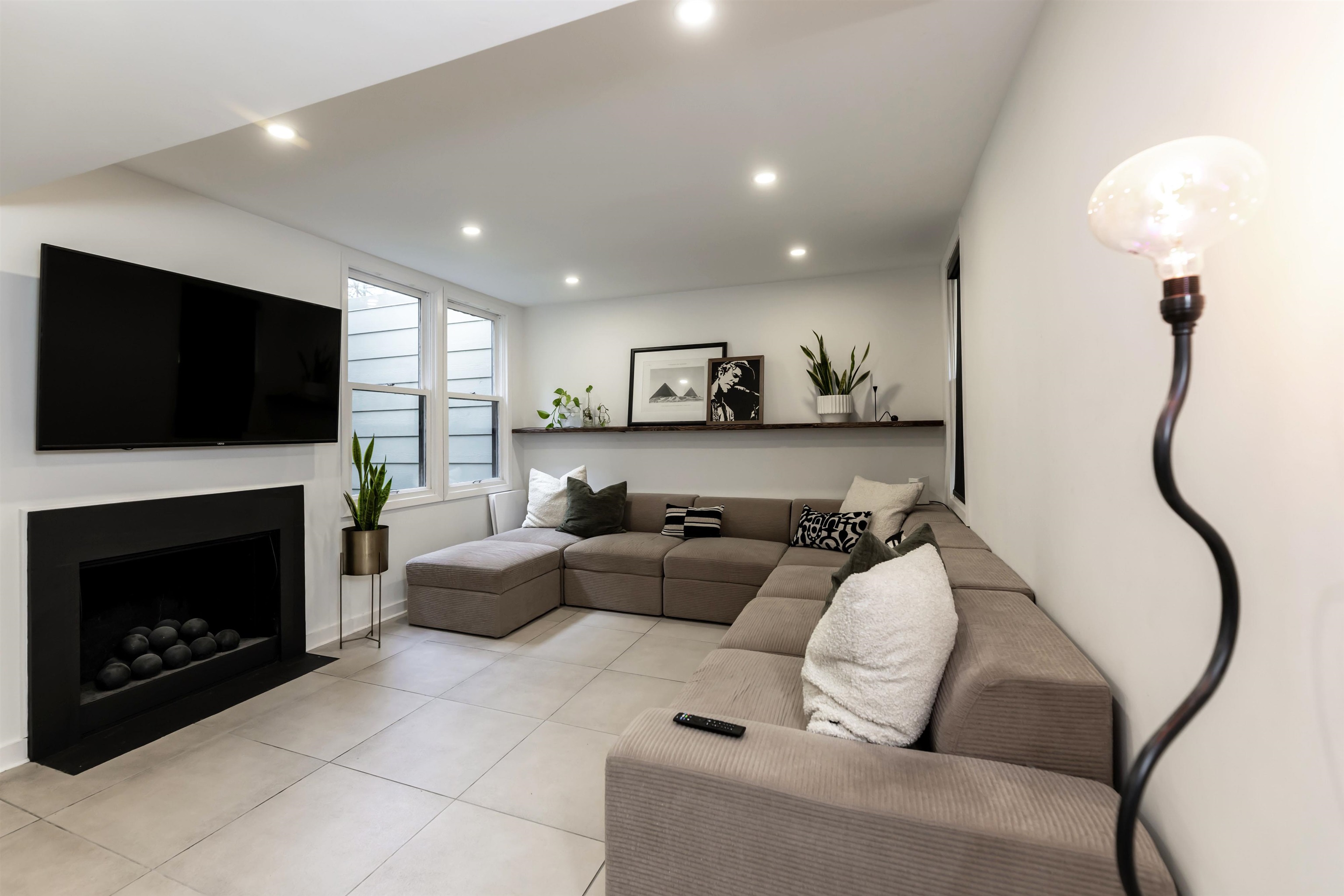 8461 Rothchild Road, Unit 37 Germantown, TN 38139 - Photo 11 of 28 Living room featuring a fireplace. Recessed lighting, and modern large format tile