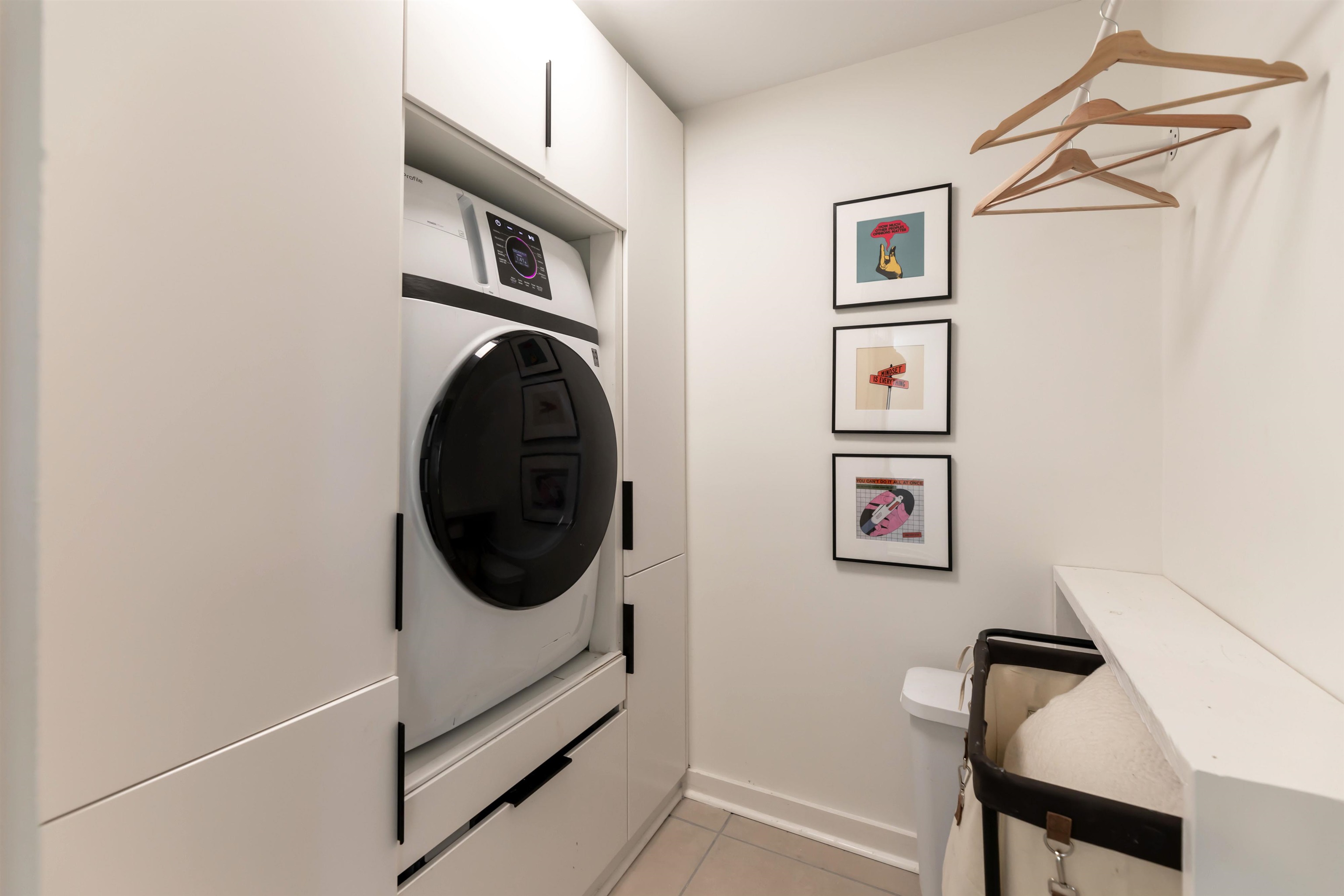 8461 Rothchild Road, Unit 37 Germantown, TN 38139 - Photo 18 of 28 Custom laundry cabinetry with 2-in-1 washer and dryer