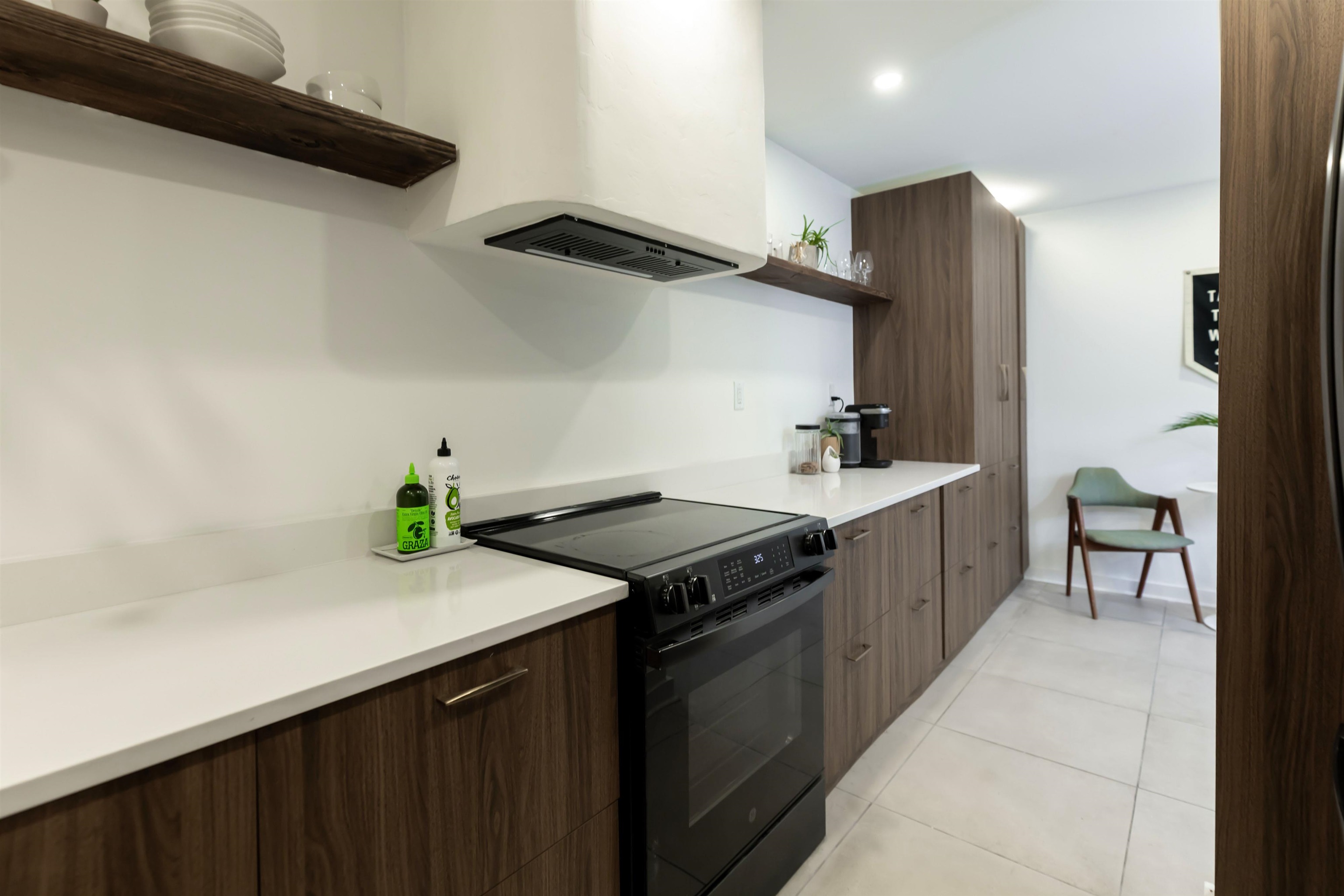 8461 Rothchild Road, Unit 37 Germantown, TN 38139 - Photo 7 of 28 Renovated kitchen with open shelves, slate appliances, walnut look modern cabinets, and recessed lighting
