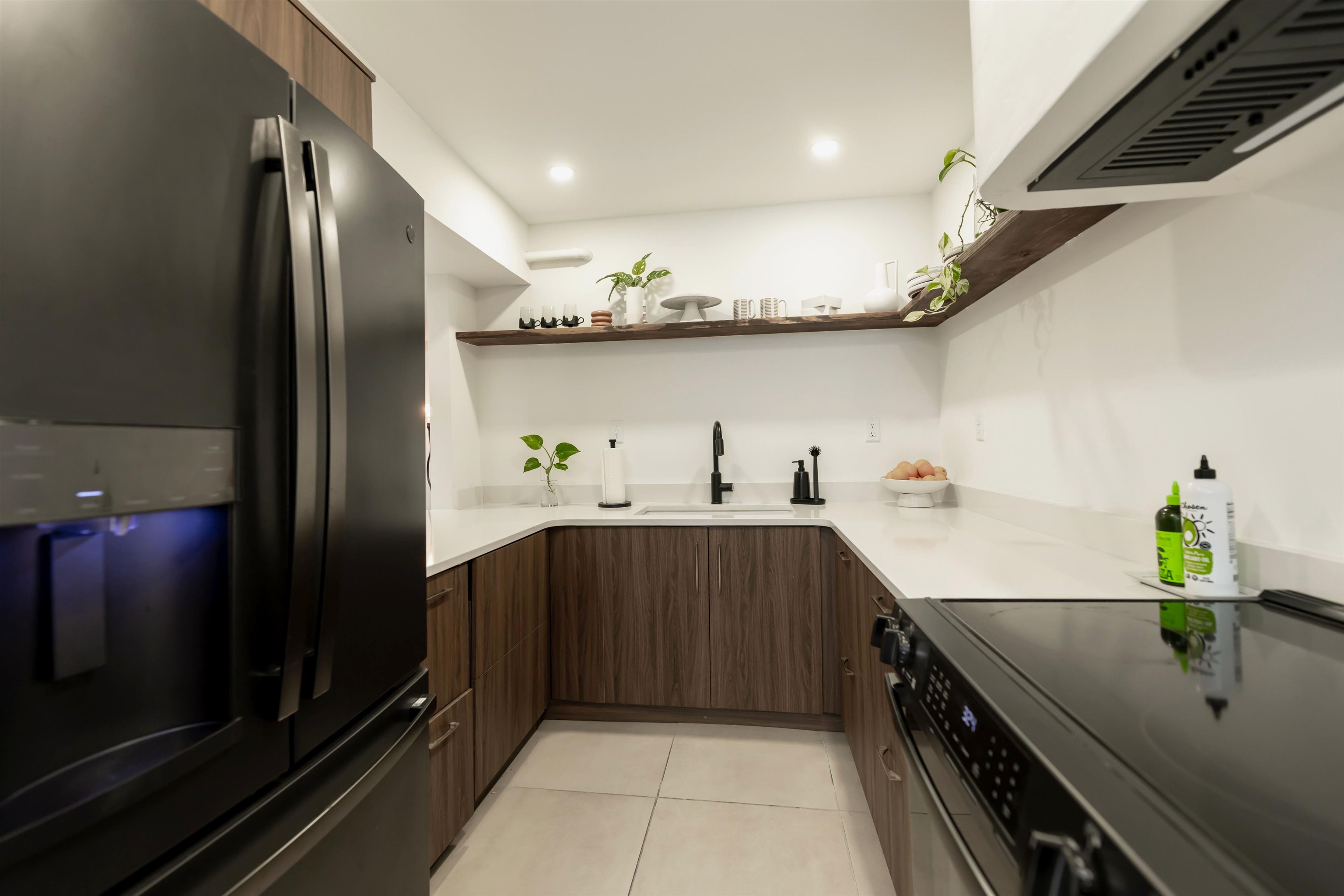 8461 Rothchild Road, Unit 37 Germantown, TN 38139 - Photo 10 of 28 Renovated kitchen with open shelves, slate appliances, walnut look modern cabinets, and recessed lighting