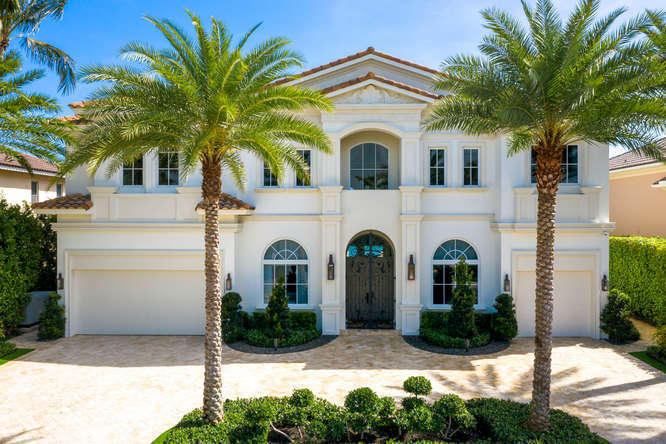 620 Golden Harbour Drive Boca Raton, FL 33432 - Photo 1 of 45 a view of white house with a yard