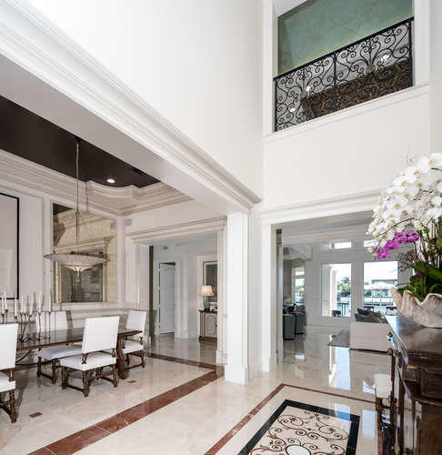 620 Golden Harbour Drive Boca Raton, FL 33432 - Photo 12 of 45 a living room with furniture and a potted plant