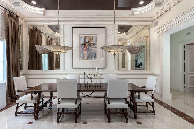 620 Golden Harbour Drive Boca Raton, FL 33432 - Photo 13 of 45 a view of a dining room with furniture and a chandelier