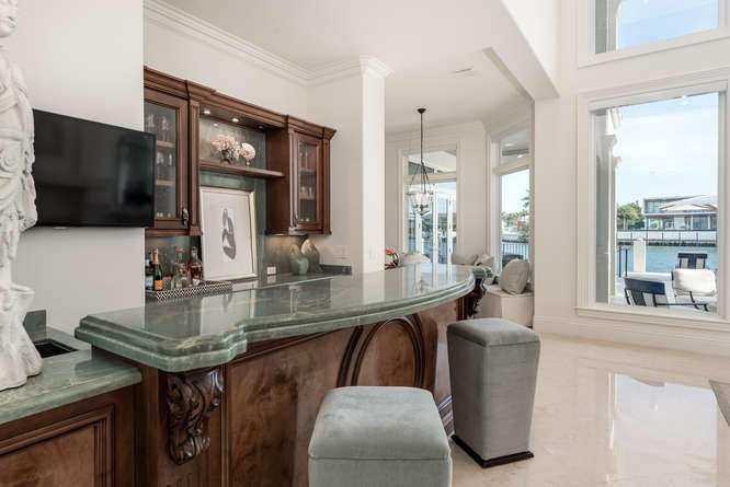 620 Golden Harbour Drive Boca Raton, FL 33432 - Photo 16 of 45 a kitchen with counter top space a sink and appliances