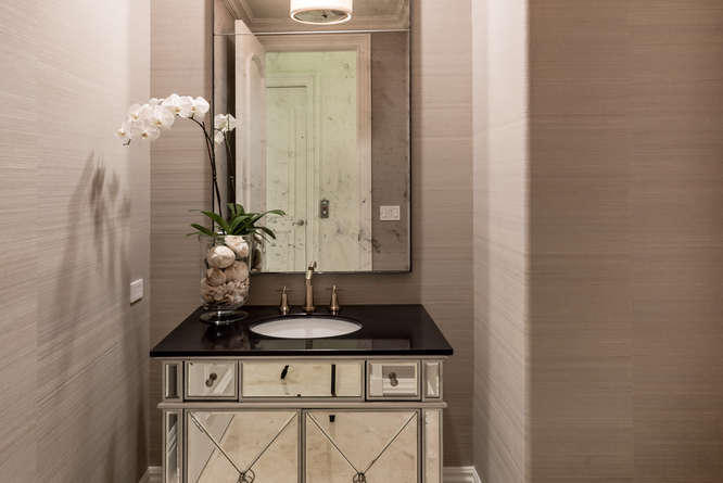 620 Golden Harbour Drive Boca Raton, FL 33432 - Photo 18 of 45 a bathroom with a sink and a mirror