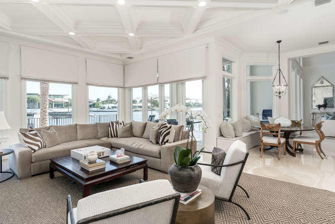 620 Golden Harbour Drive Boca Raton, FL 33432 - Photo 19 of 45 a living room with furniture and a large window