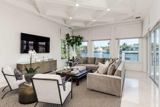 620 Golden Harbour Drive Boca Raton, FL 33432 - Photo 21 of 45 a living room with furniture and a flat screen tv