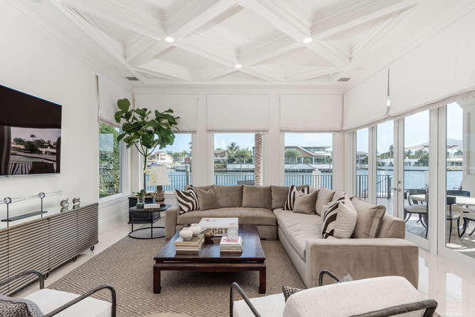 620 Golden Harbour Drive Boca Raton, FL 33432 - Photo 22 of 45 a living room with furniture and a large window
