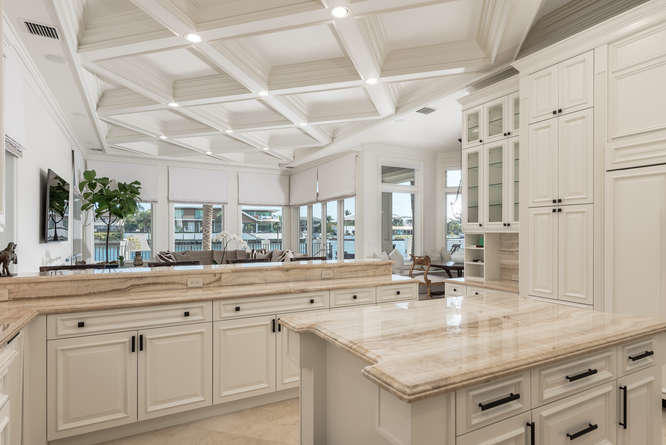620 Golden Harbour Drive Boca Raton, FL 33432 - Photo 26 of 45 a kitchen with sink stove and cabinets