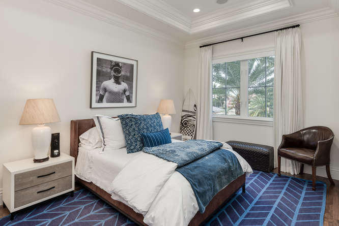 620 Golden Harbour Drive Boca Raton, FL 33432 - Photo 35 of 45 a bedroom with a bed and a window