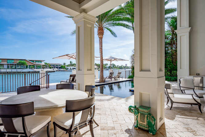 620 Golden Harbour Drive Boca Raton, FL 33432 - Photo 38 of 45 a view of an outdoor space with seating area