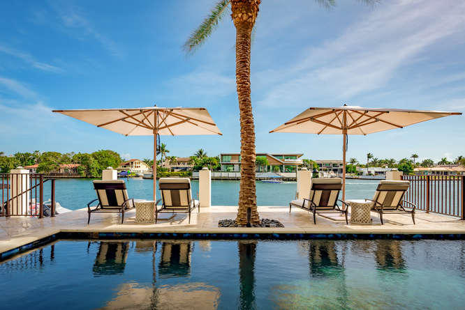 620 Golden Harbour Drive Boca Raton, FL 33432 - Photo 41 of 45 a view of a terrace with furniture
