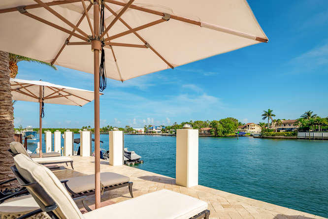 620 Golden Harbour Drive Boca Raton, FL 33432 - Photo 45 of 45 a view of a terrace with chairs