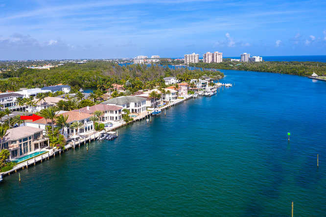 620 Golden Harbour Drive Boca Raton, FL 33432 - Photo 8 of 45 an aerial view of residential building with outdoor space and lake view