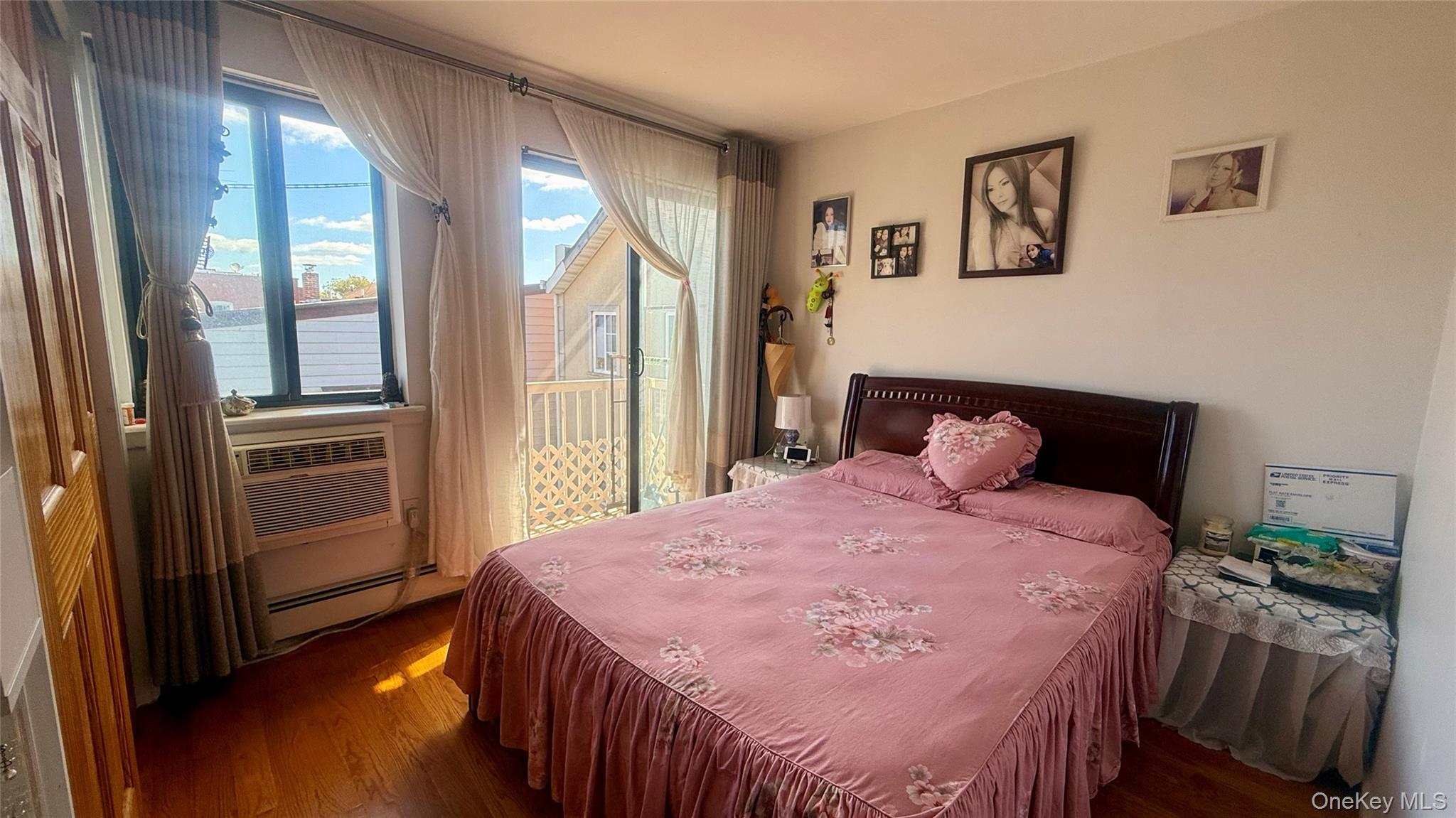 37-33 107th Street, Unit 3B Queens, NY 11368 - Photo 6 of 10 1st bedroom with balcony facing East with closet